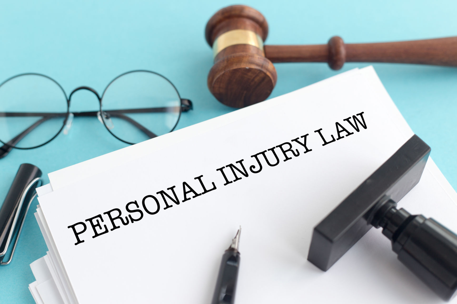 Personal Injury Lawyer Tippecanoe County, IN legal document with glasses and gavel