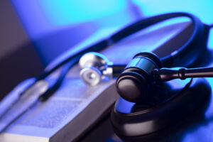 Personal Injury Lawyer Frankfort, IN - legal book stethoscope - gavel